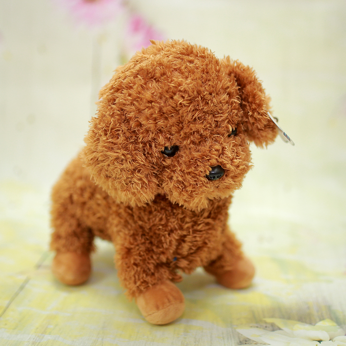 Thú bông chó xù đeo chuông M65